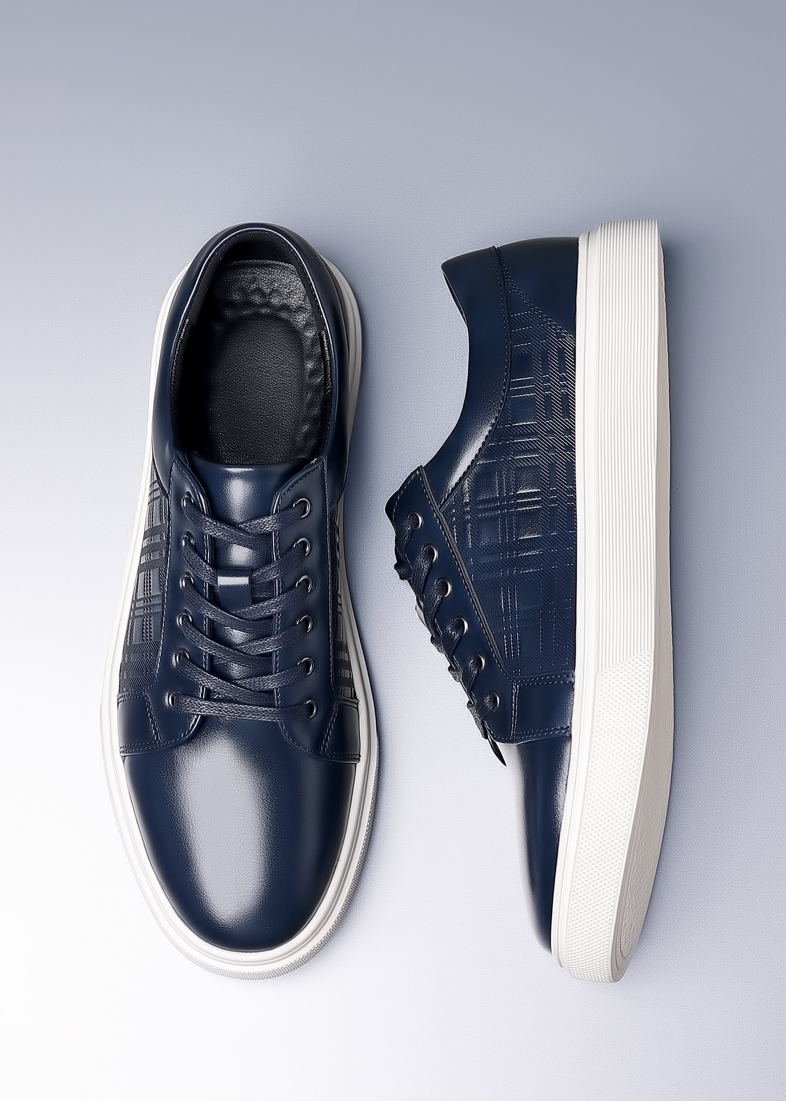 Zapatillas clásicas de piel a cuadros para hombre